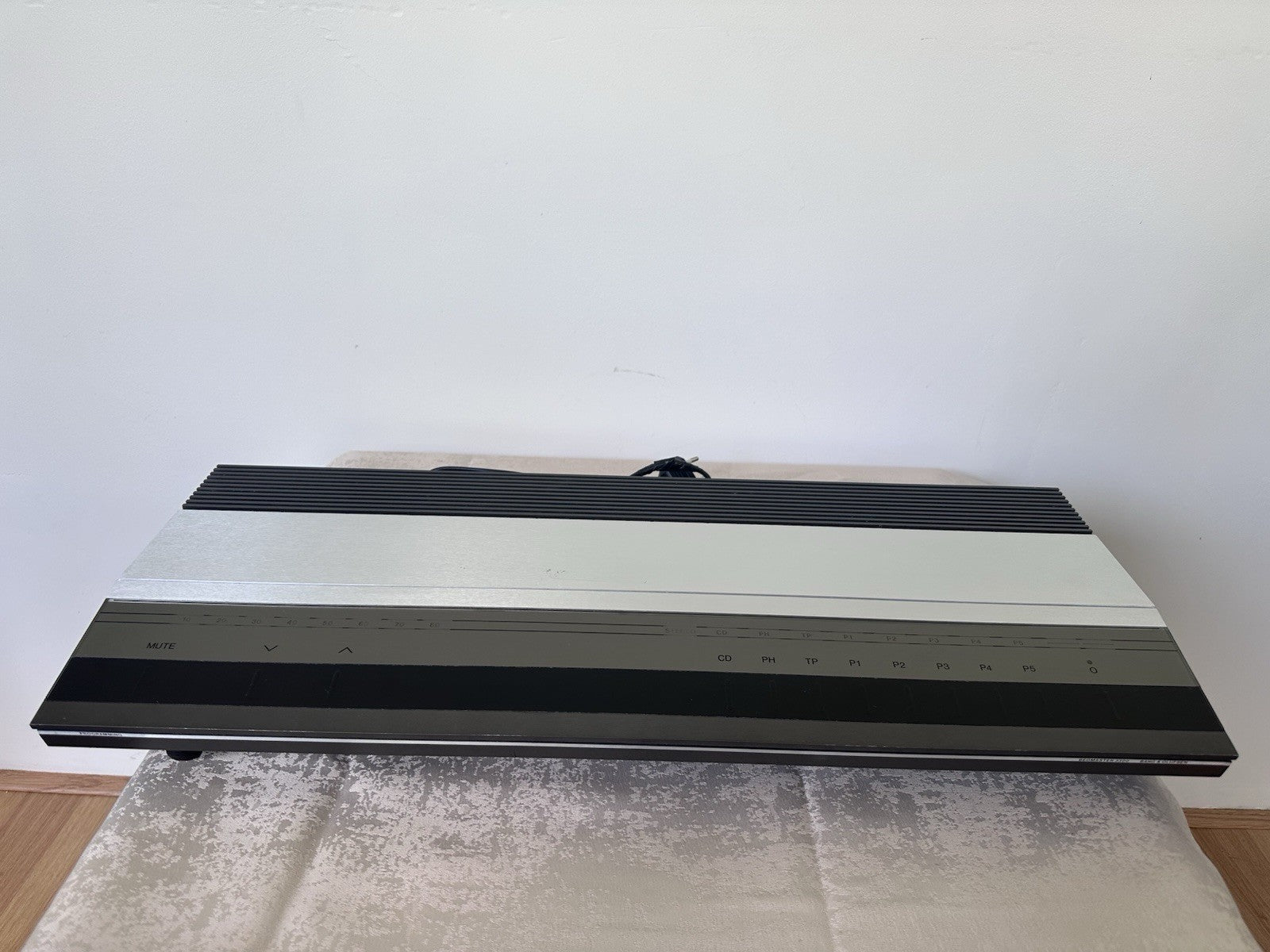 B&O Beomaster 3300 receiver - vintage hi-fi amplifier front view with silver and black design
